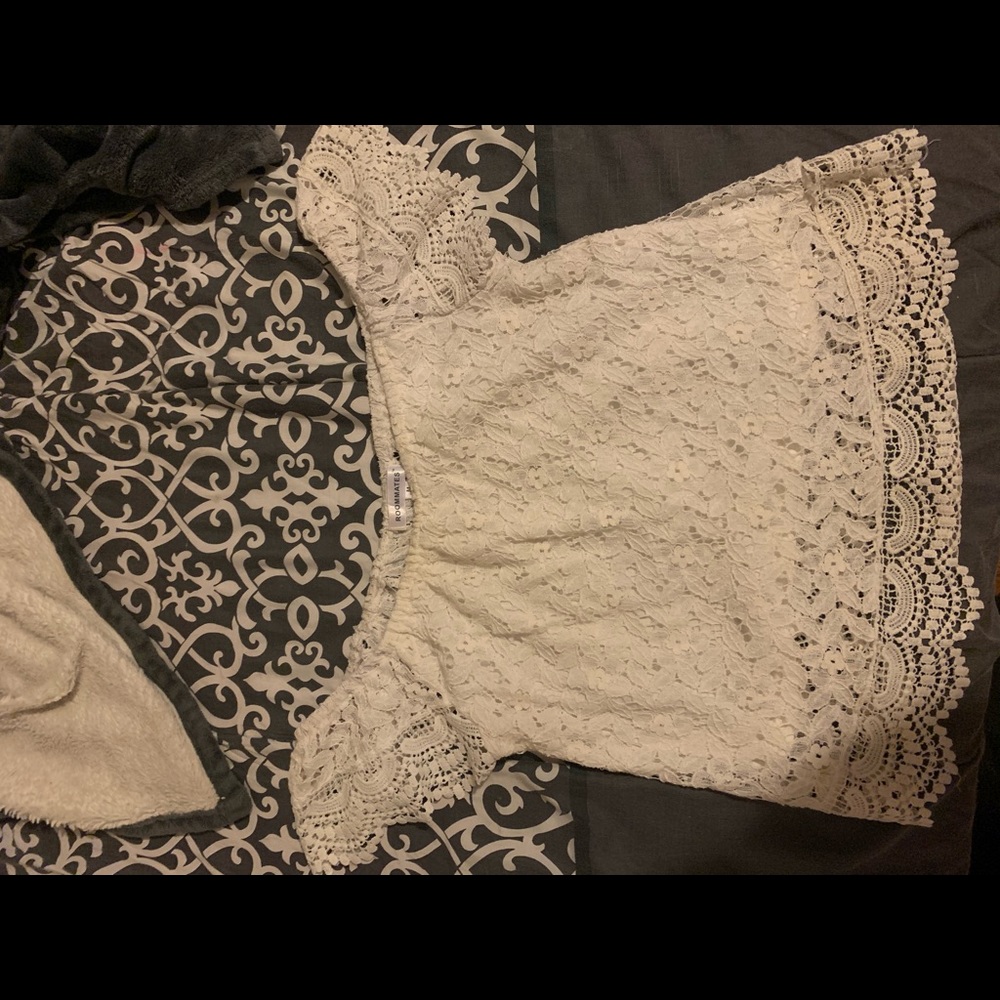 white, off-the-shoulder top.